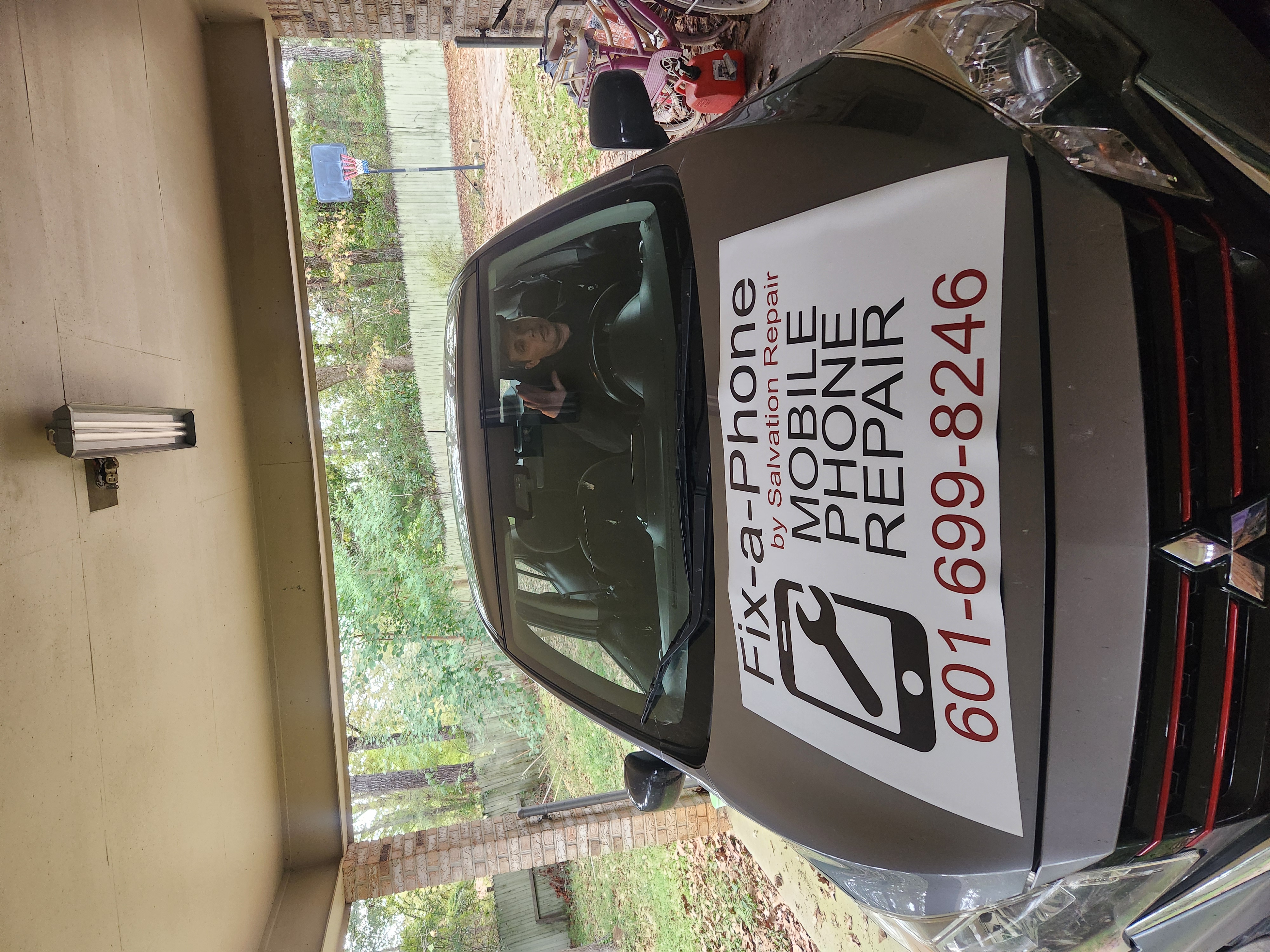 Salvation Repair service van and storefront